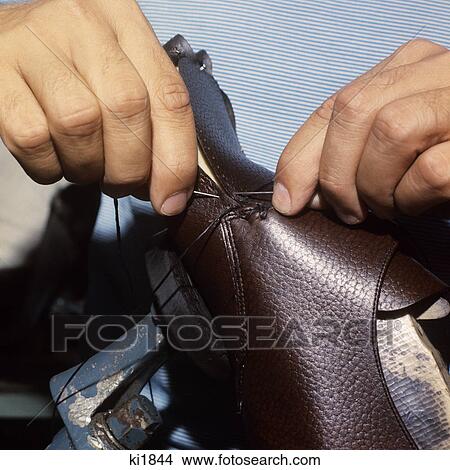 1970s detail hands sewing leather shoes puerto rico manufacturing hand sewn View Large Photo Image Picture - 1970s detail hands sewing leather shoes puerto rico manufacturing hand sewn. Fotosearch