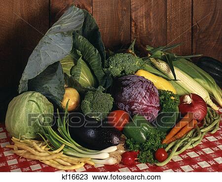 1970s display of fresh garden vegetables on red checkered tablecloth View Large Photo Image Stock Image - 1970s display of fresh garden vegetables on red checkered tablecloth. Fotosearch
