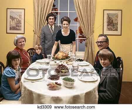 1970s family dinner View Large Photo Image Stock Photo - 1970s family dinner. Fotosearch