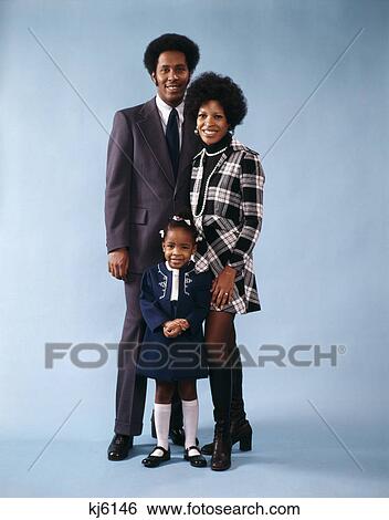 1970s family portrait mother father daughter black african american ` View Large Photo Image Stock Photograph - 1970s family portrait mother father daughter black african american `. Fotosearch