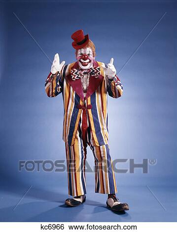1970s full length portrait of clown in striped costume View Large Photo Image Stock Photograph - 1970s full length portrait of clown in striped costume. Fotosearch