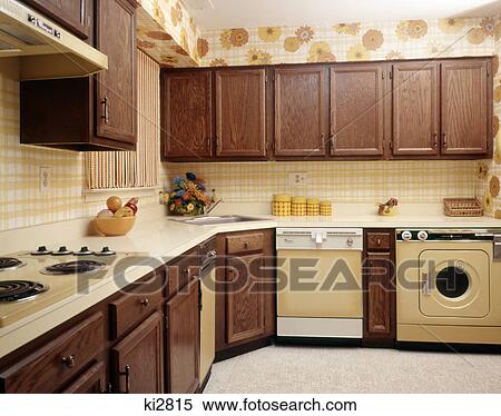 1970s kitchen interior with yellow appliances and print wallpaper View Large Photo Image Stock Photography - 1970s kitchen interior with yellow appliances and print wallpaper. Fotosearch