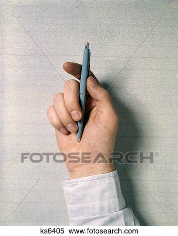 1970s man hand holding ball point ink pen View Large Photo Image Stock Photography - 1970s man hand holding ball point ink pen. Fotosearch