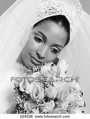 1970s pensive african american woman bride portrait with bouquet of flowers View Large Photo Image Stock Photo - 1970s pensive african american woman bride portrait with bouquet of flowers. Fotosearch