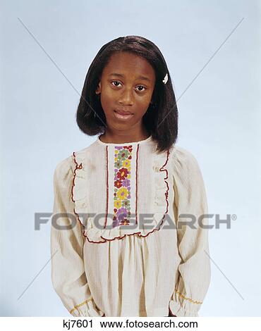 1970s portrait of african american girl wearing embroidered peasant blouse View Large Photo Image Stock Image - 1970s portrait of african american girl wearing embroidered peasant blouse. Fotosearch