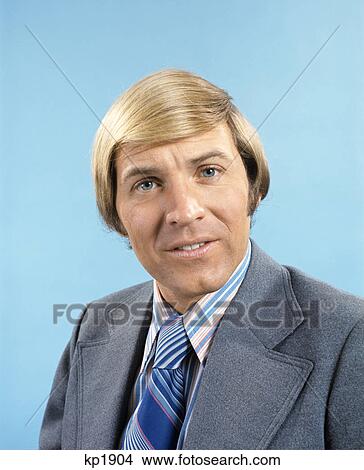 1970s portrait of blond man wearing grey suit blue striped tie View Large Photo Image Picture - 1970s portrait of blond man wearing grey suit blue striped tie. Fotosearch