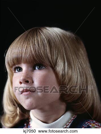 1970s portrait serious blond girl looking up View Large Photo Image Stock Image - 1970s portrait serious blond girl looking up. Fotosearch