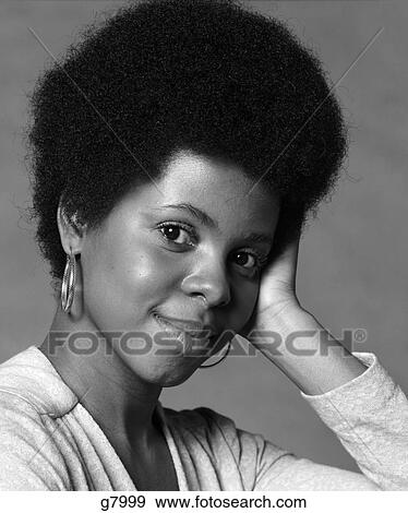 1970s portrait woman black african american smile looking at camera View Large Photo Image Stock Photo - 1970s portrait woman black african american smile looking at camera. Fotosearch