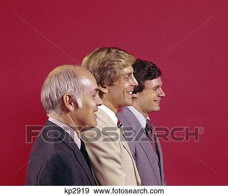 1970s profile head and shoulders portrait of three smiling businessmen in suits View Large Photo Image Stock Photo - 1970s profile head and shoulders portrait of three smiling businessmen in suits. Fotosearch