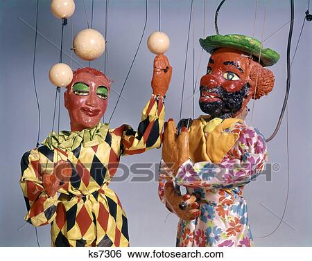 1970s puppet show juggler and clown circus View Large Photo Image Stock Photograph - 1970s puppet show juggler and clown circus. Fotosearch