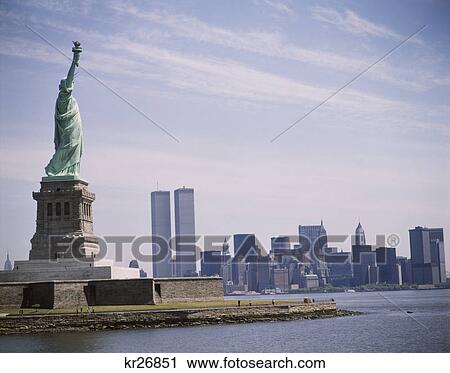1970s statue of liberty overlooking lower manhattan skyline new york city, ny View Large Photo Image Stock Image - 1970s statue of liberty overlooking lower manhattan skyline new york city, ny. Fotosearch