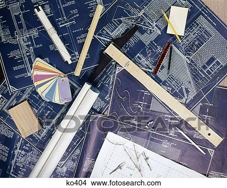 1970s still life of building blueprints slide rule templates color samples other architect builder items View Large Photo Image Picture - 1970s still life of building blueprints slide rule templates color samples other architect builder items. Fotosearch