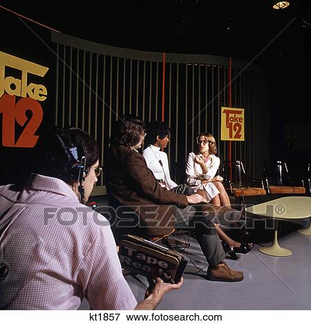 1970s television studio set news talk show View Large Photo Image Stock Photo - 1970s television studio set news talk show. Fotosearch