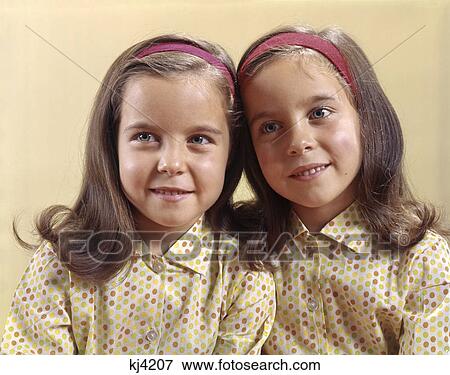 1970s twins sisters smile polka dot View Large Photo Image Stock Photo - 1970s twins sisters smile polka dot. Fotosearch