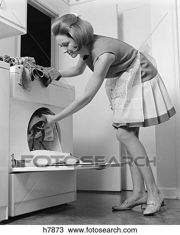 1970s woman dryer laundry View Large Photo Image Stock Image - 1970s woman dryer laundry. Fotosearch