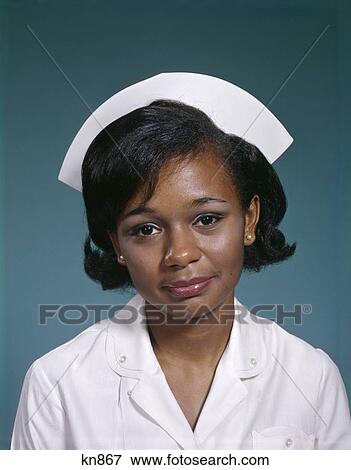 1970s woman nurse medical portrait View Large Photo Image Stock Photo - 1970s woman nurse medical portrait. Fotosearch