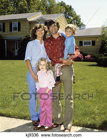 1980s family in front of suburban home mother father boy girl portrait front lawn View Large Photo Image Stock Photograph - 1980s family in front of suburban home mother father boy girl portrait front lawn. Fotosearch