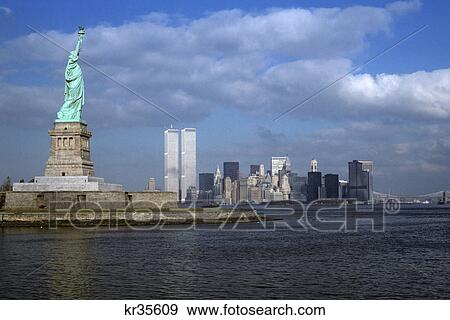 Stock Photo - 1980s new york ny statue of liberty city skyline downtown world trade center towers. Fotosearch
