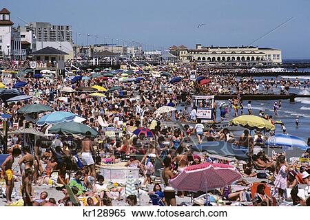 1980s ocean city nj crowded beach in summer View Large Photo Image Stock Photography - 1980s ocean city nj crowded beach in summer. Fotosearch