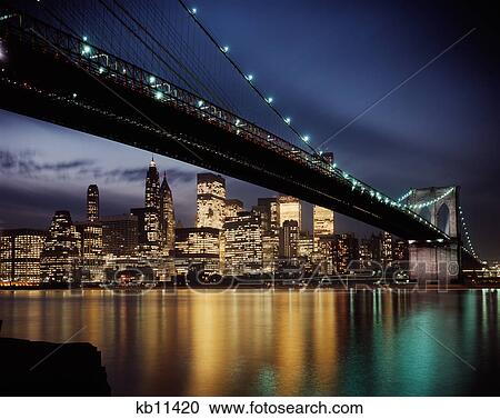 1980s view of lower manhattan new york under brooklyn bridge at night View Large Photo Image Stock Image - 1980s view of lower manhattan new york under brooklyn bridge at night. Fotosearch