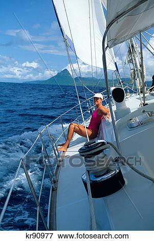 1980s woman bow boat sailing saint lucia petit piton west indies View Large Photo Image Stock Photo - 1980s woman bow boat sailing saint lucia petit piton west indies. Fotosearch