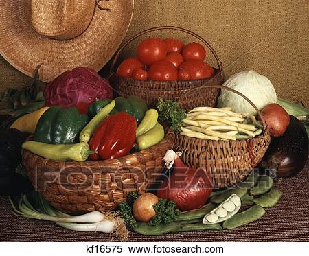 baskets full of farm fresh vegetables with farmers straw hat hanging on wall View Large Photo Image Stock Photography - baskets full of farm fresh vegetables with farmers straw hat hanging on wall. Fotosearch
