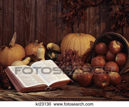 bible open to psalms and harvest basket of apples pumpkins grapes and autumn leaves View Large Photo Image Stock Image - bible open to psalms and harvest basket of apples pumpkins grapes and autumn leaves. Fotosearch