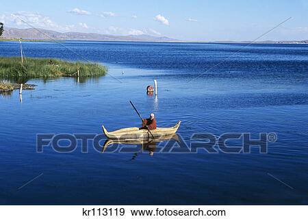 bolivia lake titicaca aymara indian man in totora reed boat View Large Photo Image Stock Photo - bolivia lake titicaca aymara indian man in totora reed boat. Fotosearch