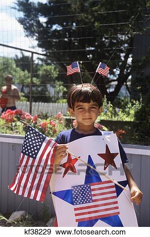 boy wearing u. s. flag for fourth of july View Large Photo Image Stock Photo - boy wearing u. s. flag for fourth of july. Fotosearch