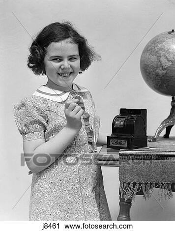 child putting money coin into register bank smiling holding View Large Photo Image Stock Image - child putting money coin into register bank smiling holding. Fotosearch