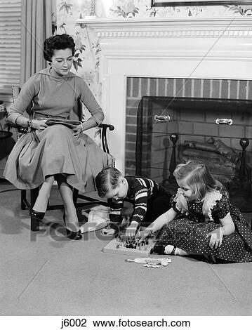 children playing game fireplace living room View Large Photo Image Stock Image - children playing game fireplace living room. Fotosearch