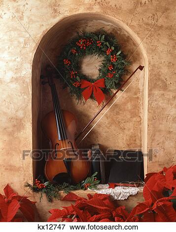 christmas still life violin books bible and wreath in a niche with poinsettias View Large Photo Image Stock Photo - christmas still life violin books bible and wreath in a niche with poinsettias. Fotosearch