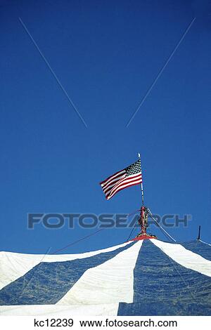 circus tent top with flag View Large Photo Image Stock Photo - circus tent top with flag. Fotosearch