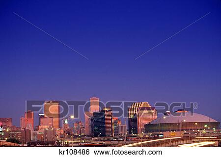 city skyline in evening new orleans, louisiana View Large Photo Image Stock Photograph - city skyline in evening new orleans, louisiana. Fotosearch