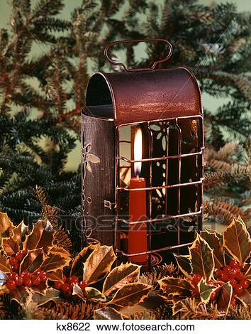 copper lantern with red candle pine and holly View Large Photo Image Stock Image - copper lantern with red candle pine and holly. Fotosearch