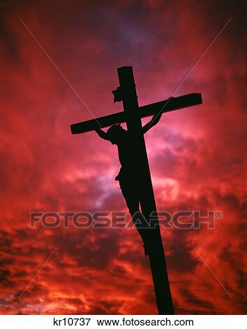 crucifixion jesus christ on the cross silhouetted against red sky View Large Photo Image Stock Photo - crucifixion jesus christ on the cross silhouetted against red sky. Fotosearch