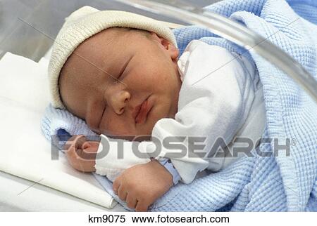 day old infant boy in hospital nursery View Large Photo Image Stock Photography - day old infant boy in hospital nursery. Fotosearch