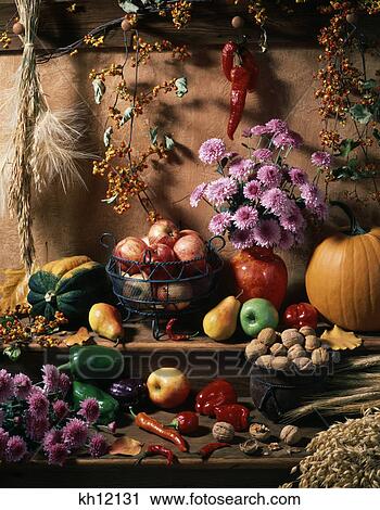 display of autumn harvest fruits grains and flowers View Large Photo Image Stock Image - display of autumn harvest fruits grains and flowers. Fotosearch
