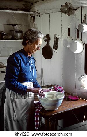 elderly woman in the kitchen View Large Photo Image Stock Photo - elderly woman in the kitchen. Fotosearch