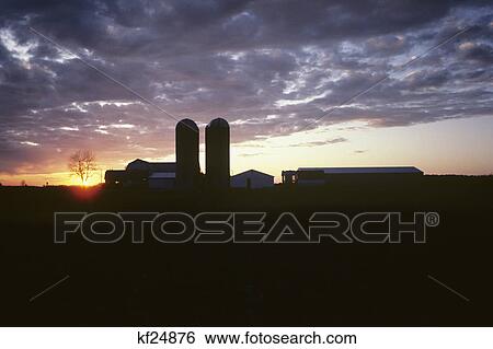 farm buildings & silos at sunset van wert county ohio View Large Photo Image Stock Photograph - farm buildings & silos at sunset van wert county ohio. Fotosearch