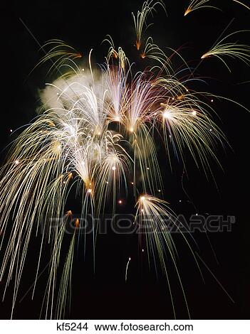 festive fireworks display in night sky View Large Photo Image Picture - festive fireworks display in night sky. Fotosearch