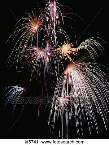 festive fireworks display in night sky View Large Photo Image Stock Image - festive fireworks display in night sky. Fotosearch