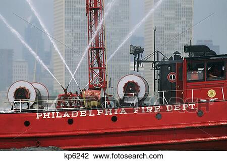 fire boat delaware shooting water cannon during tall ship parade philadelphia, pennsylvania View Large Photo Image Stock Image - fire boat delaware shooting water cannon during tall ship parade philadelphia, pennsylvania. Fotosearch