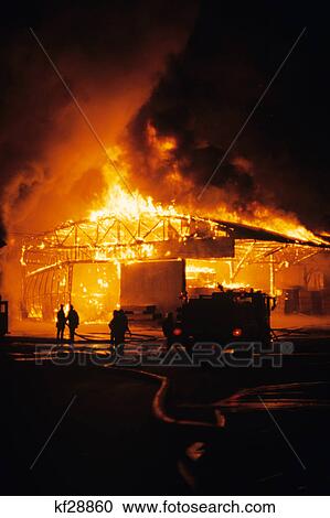firefighters working at lumberyard fire at night View Large Photo Image Stock Image - firefighters working at lumberyard fire at night. Fotosearch