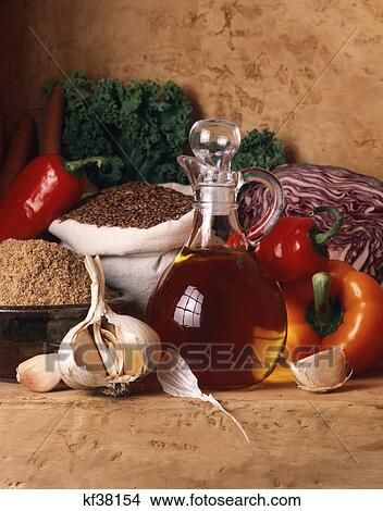 flax oil seeds and meal with garlic and vegetables View Large Photo Image Picture - flax oil seeds and meal with garlic and vegetables. Fotosearch