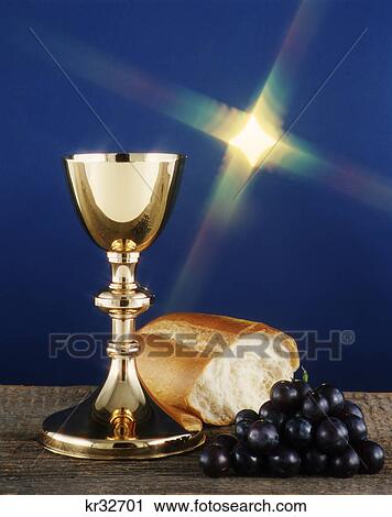 gold chalice wine grapes and bread communion still life under starry light View Large Photo Image Stock Image - gold chalice wine grapes and bread communion still life under starry light. Fotosearch