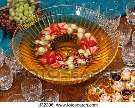 grape punch with frozen fruit ring View Large Photo Image Stock Photograph - grape punch with frozen fruit ring. Fotosearch