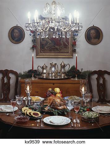 holiday dinner table turkey fancy formal setting silver wine chandelier candles View Large Photo Image Stock Photo - holiday dinner table turkey fancy formal setting silver wine chandelier candles. Fotosearch