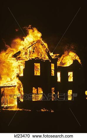 house totally engulfed in fire at night View Large Photo Image Stock Image - house totally engulfed in fire at night. Fotosearch