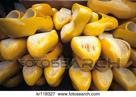 Stock Photo - kampen, holland pile of dutch wooden shoes. Fotosearch